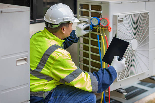 Professional Air Conditioning Repair technician working in Houston, TX